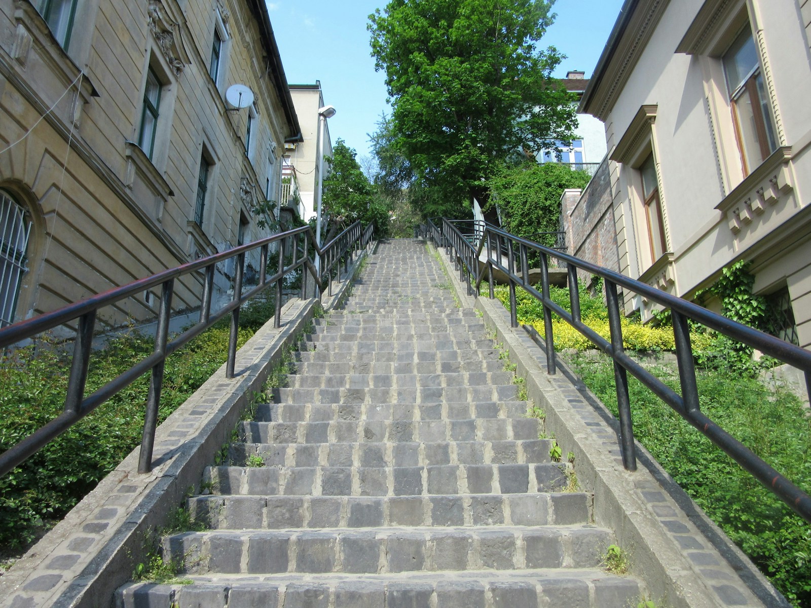 A set of stairs leading up to a building